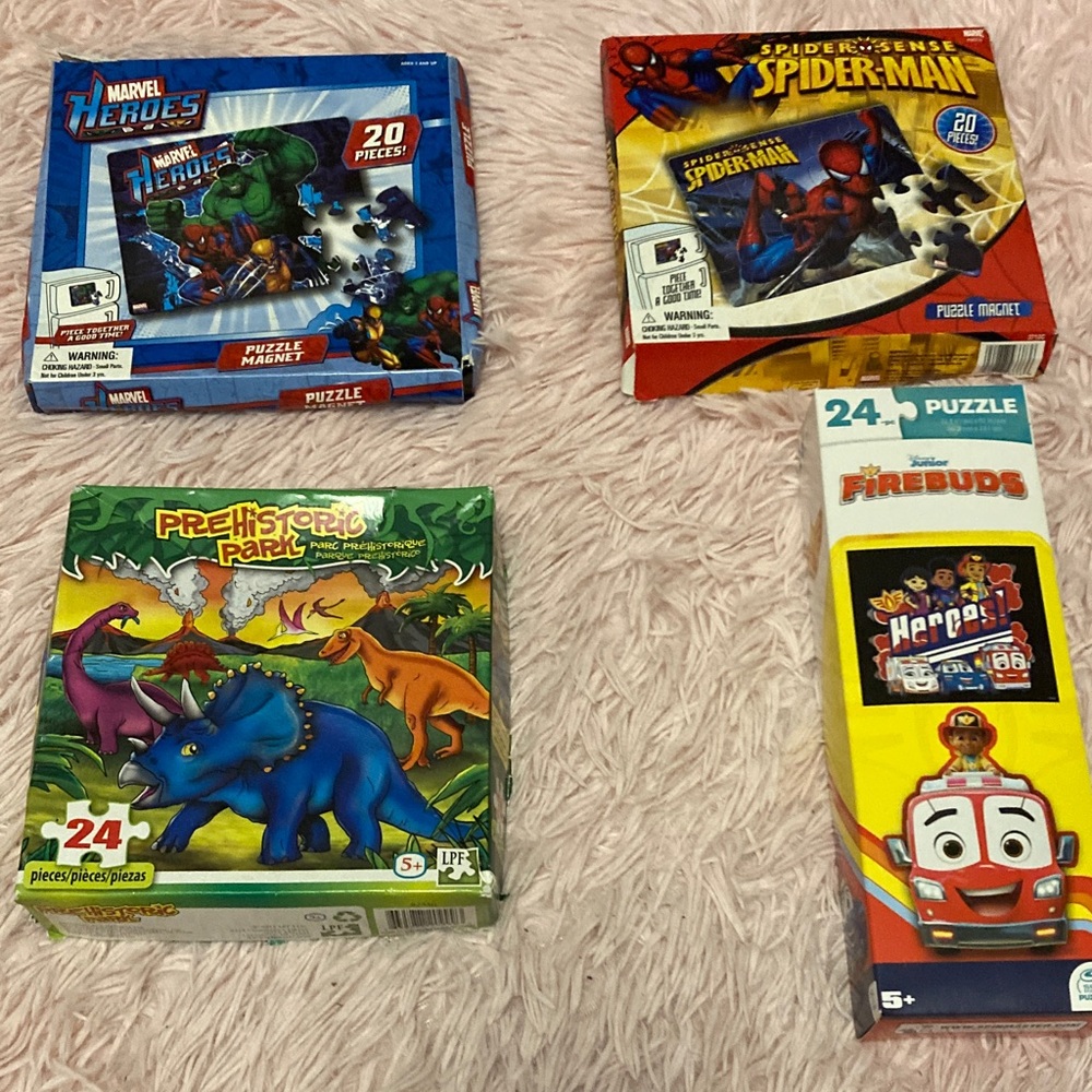 Four various children’s puzzles